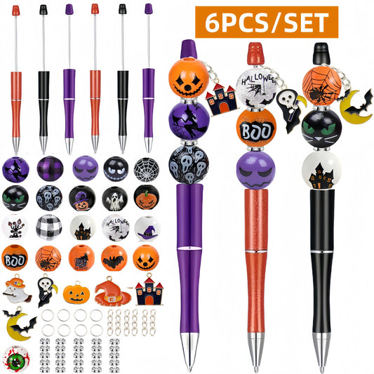 Halloween beadable pen kit - six orange, purple and black pens with pumpkin, ghost and spider web wood beads plus bat, moon and haunted house charms